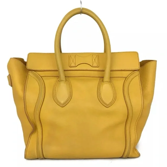 Authentic Micro Luggage Handbag In Drummed Calfskin comes with dustbag. - Picture 9 of 12